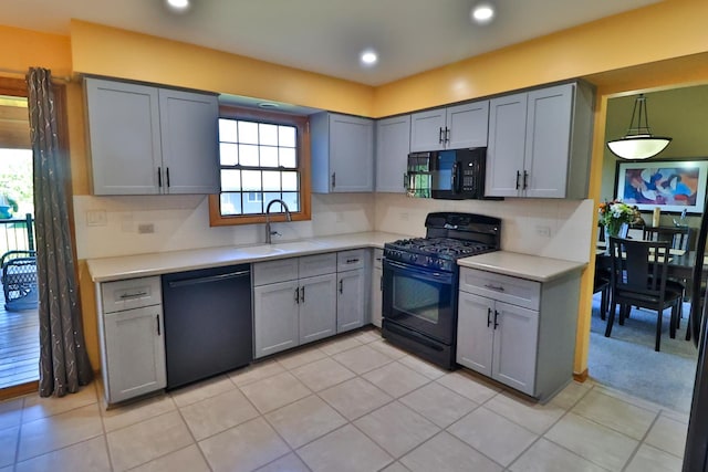523 Jaquays St, Lockport, IL 60441 - kitchen with black appliances, a sink, gray cabinets, light countertops, and recessed lighting