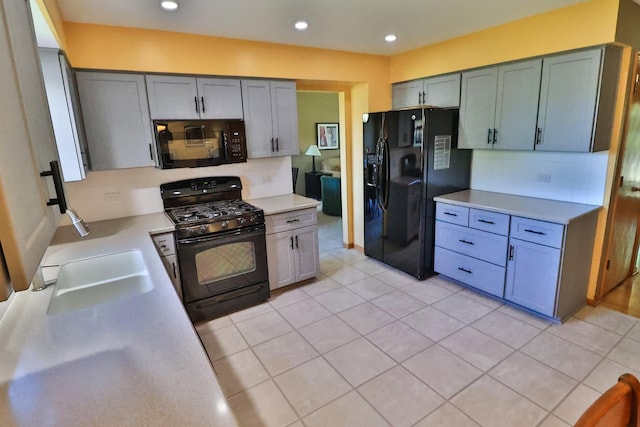 523 Jaquays St, Lockport, IL 60441 - kitchen featuring black appliances, decorative backsplash, light countertops, light tile patterned floors, and recessed lighting