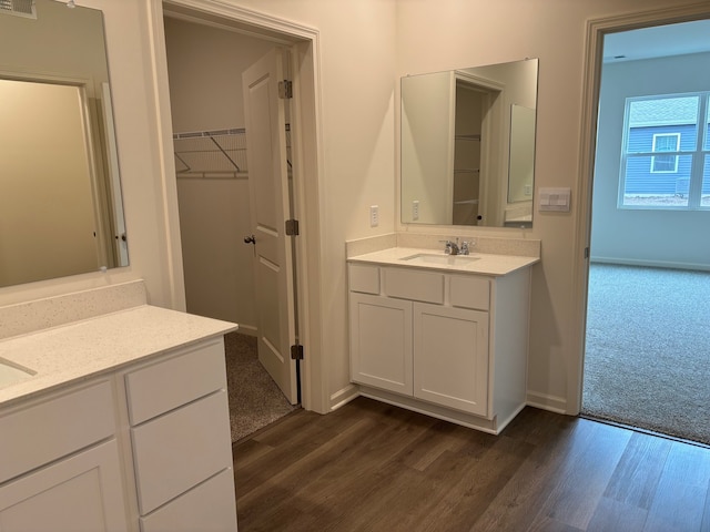 2280 Elderberry Ct, Wonder Lake, IL 60097 - bathroom featuring vanity, wood finished floors, and baseboards
