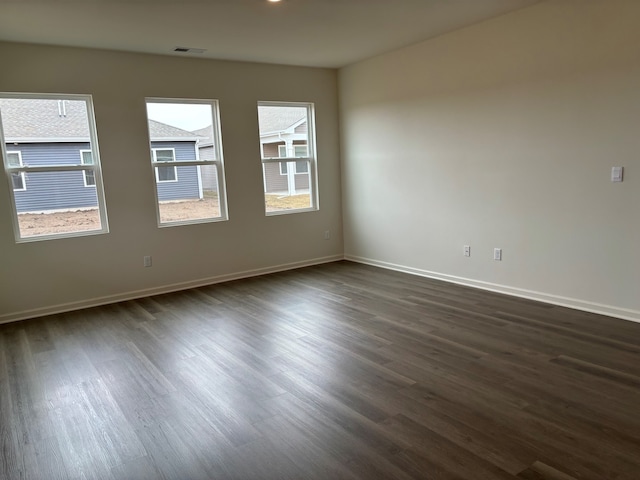 2280 Elderberry Ct, Wonder Lake, IL 60097 - spare room featuring dark wood finished floors and baseboards