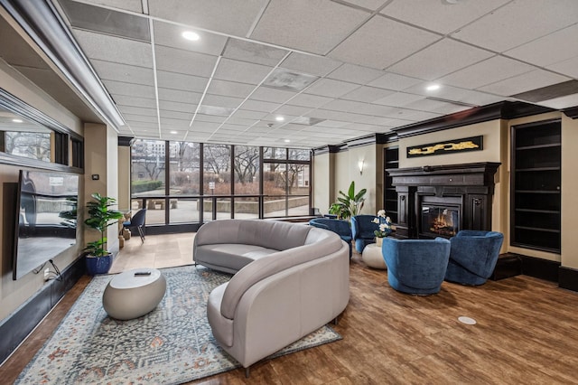 10 E Ontario St Unit 3609, Chicago, IL 60611 - living area with a glass covered fireplace, expansive windows, wood finished floors, and recessed lighting