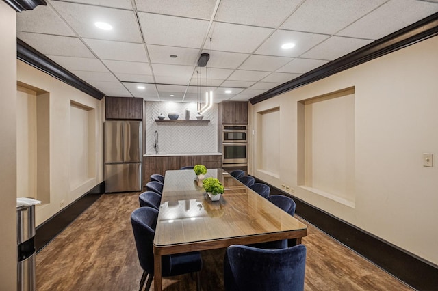 10 E Ontario St Unit 3609, Chicago, IL 60611 - dining area with dark wood-style floors, baseboards, recessed lighting, and crown molding