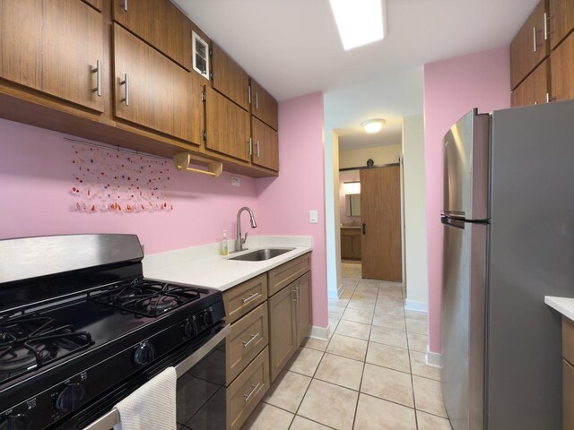 33 N Main St Unit 4J, Lombard, IL 60148 - kitchen featuring appliances with stainless steel finishes, light tile patterned floors, light countertops, and brown cabinets