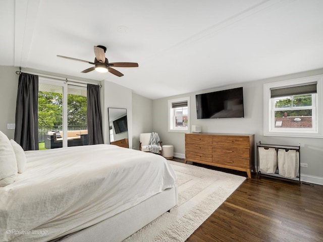 1344 W George St Unit 3, Chicago, IL 60657 - bedroom with multiple windows, dark wood finished floors, baseboards, and access to outside
