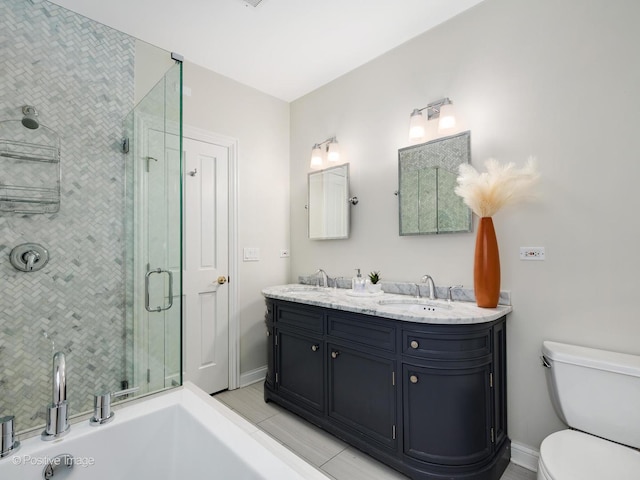 1344 W George St Unit 3, Chicago, IL 60657 - bathroom featuring a stall shower, double vanity, toilet, and baseboards