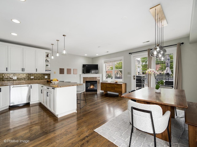 1344 W George St Unit 3, Chicago, IL 60657 - kitchen with dishwasher, a peninsula, dark wood-style flooring, white cabinets, and open shelves