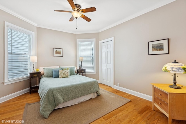 1513 W Highland Ave, Chicago, IL 60660 - bedroom featuring light wood-style flooring, crown molding, a closet, and a ceiling fan