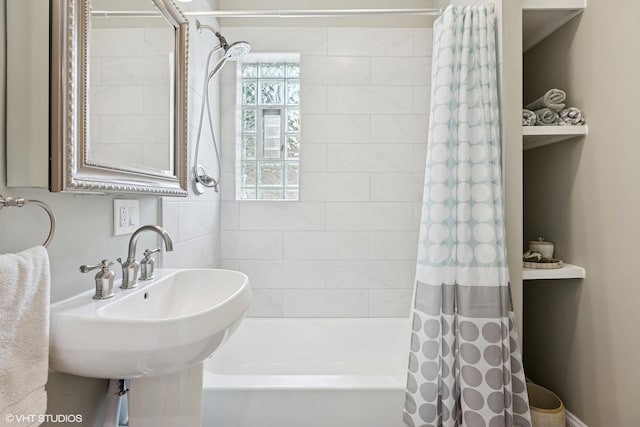 1513 W Highland Ave, Chicago, IL 60660 - bathroom with shower / bathtub combination with curtain and a sink