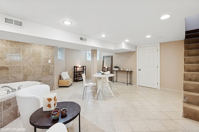 1513 W Highland Ave, Chicago, IL 60660 - living room featuring stairs, light tile patterned floors, and recessed lighting