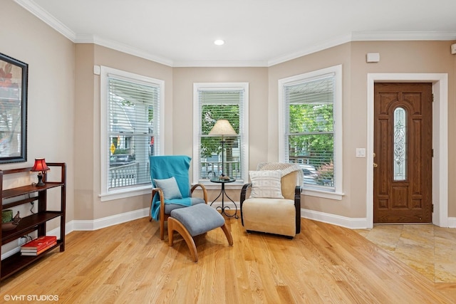 1513 W Highland Ave, Chicago, IL 60660 - living area with plenty of natural light, light wood finished floors, and ornamental molding