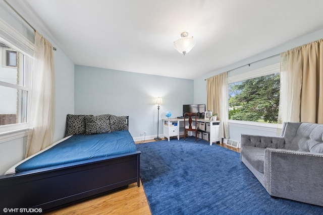5112 N Canfield Ave, Norridge, IL 60706 - bedroom featuring light wood-type flooring and baseboards