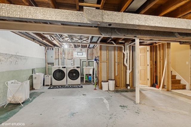 5112 N Canfield Ave, Norridge, IL 60706 - basement featuring washing machine and clothes dryer, stairs, and electric panel