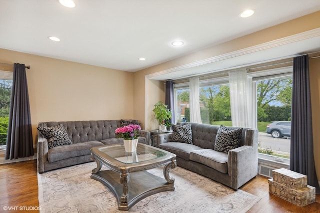 5112 N Canfield Ave, Norridge, IL 60706 - living room featuring plenty of natural light, wood finished floors, and recessed lighting