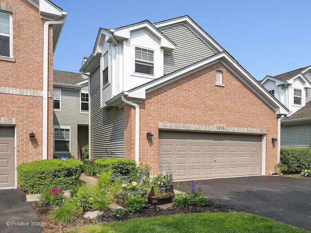 1016 Hummingbird Way, Bartlett, IL 60103 - view of front of house with brick siding and asphalt driveway