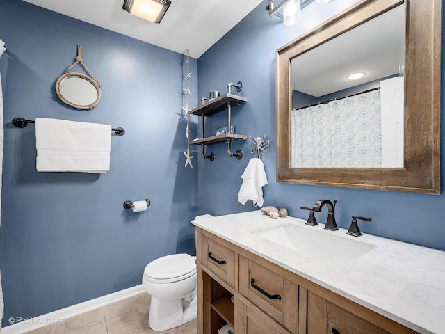 1016 Hummingbird Way, Bartlett, IL 60103 - full bath featuring toilet, vanity, tile patterned flooring, and baseboards
