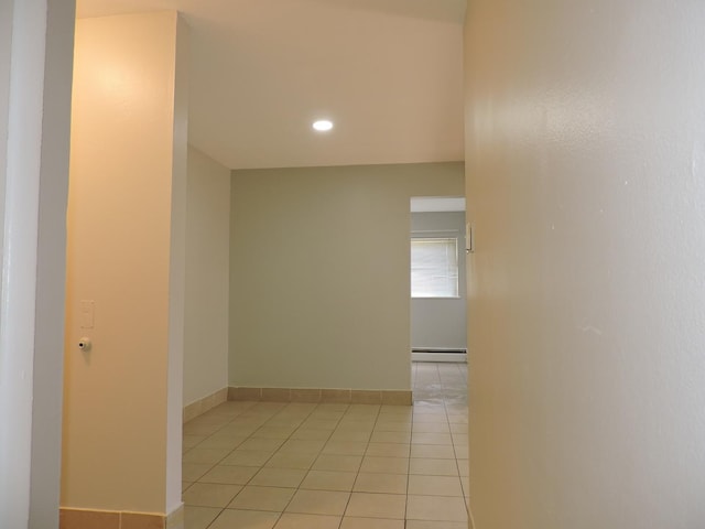 703 E Fullerton Ave Unit 1-110, Glendale Heights, IL 60139 - corridor with a baseboard heating unit, light tile patterned floors, and recessed lighting