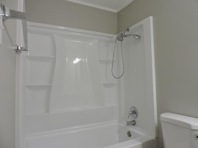 703 E Fullerton Ave Unit 1-110, Glendale Heights, IL 60139 - bathroom featuring toilet and  shower combination
