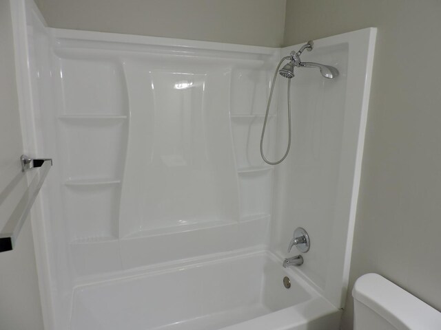 703 E Fullerton Ave Unit 1-110, Glendale Heights, IL 60139 - bathroom with toilet and shower / bath combination