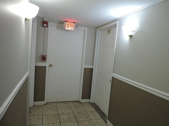 703 E Fullerton Ave Unit 1-110, Glendale Heights, IL 60139 - hall featuring baseboards and light tile patterned floors
