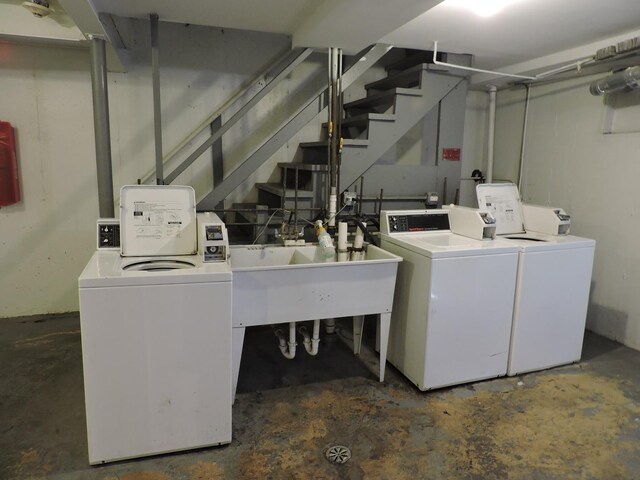 703 E Fullerton Ave Unit 1-110, Glendale Heights, IL 60139 - laundry room featuring washer and dryer and a sink