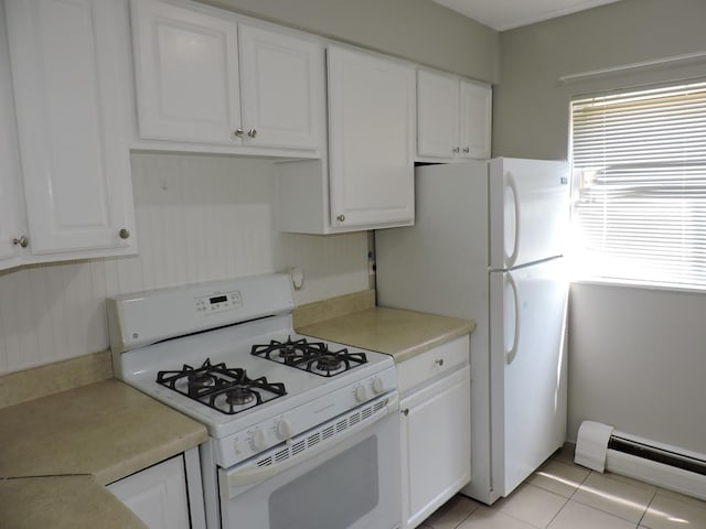 703 E Fullerton Ave Unit 1-110, Glendale Heights, IL 60139 - kitchen with white gas range oven, baseboard heating, white cabinetry, light countertops, and light tile patterned floors