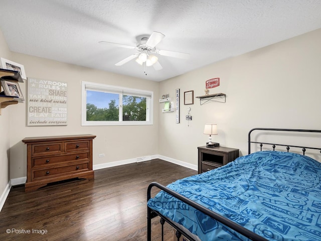 625 N Dupage Ave, Addison, IL 60101 - bedroom featuring baseboards, wood finished floors, a textured ceiling, and ceiling fan