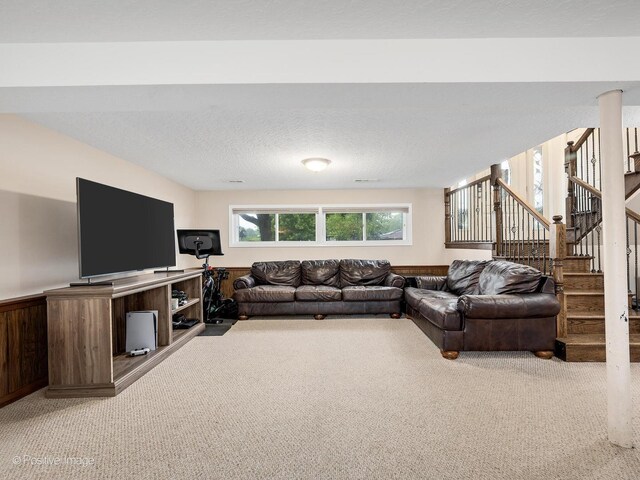 625 N Dupage Ave, Addison, IL 60101 - living area featuring light colored carpet, stairway, and a textured ceiling