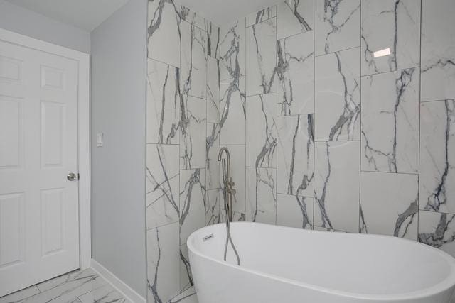 615 E 101st Pl, Chicago, IL 60628 - full bathroom with marble finish floors and a freestanding bath