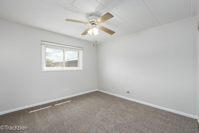 9105 S Roberts Rd Unit 1A, Hickory Hills, IL 60457 - carpeted spare room with baseboards and ceiling fan