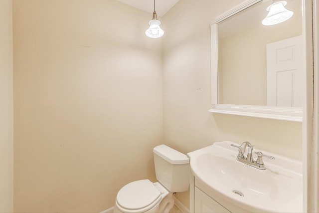 1415 W Lunt Ave Unit 203, Chicago, IL 60626 - half bathroom with toilet, vanity, and baseboards