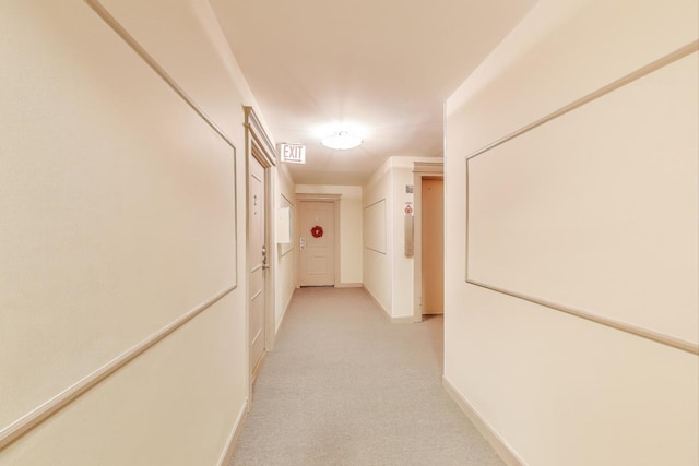 1415 W Lunt Ave Unit 203, Chicago, IL 60626 - hall featuring light carpet and baseboards