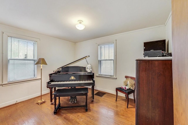 10752 S Washtenaw Ave, Chicago, IL 60655 - living area featuring wood finished floors, crown molding, and baseboards
