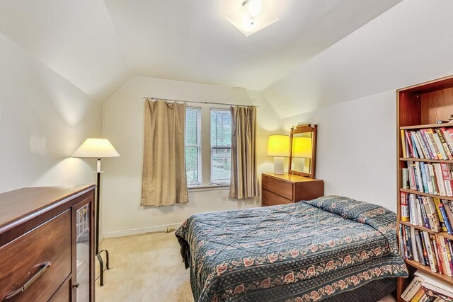 10752 S Washtenaw Ave, Chicago, IL 60655 - carpeted bedroom with lofted ceiling and baseboards