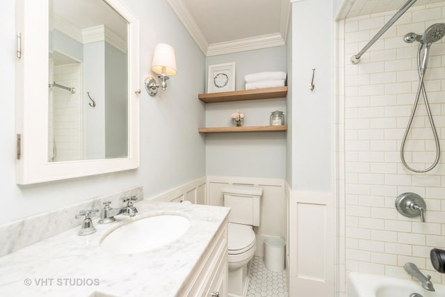 623 Cumnor Ave, Barrington, IL 60010 - bathroom with crown molding, vanity, toilet, bathing tub / shower combination, and a wainscoted wall