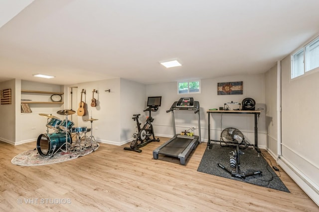 623 Cumnor Ave, Barrington, IL 60010 - exercise area featuring a baseboard heating unit, wood finished floors, and baseboards