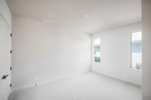 8 Heritage Dr, Highland Park, IL 60035 - spare room with baseboards, light colored carpet, and recessed lighting