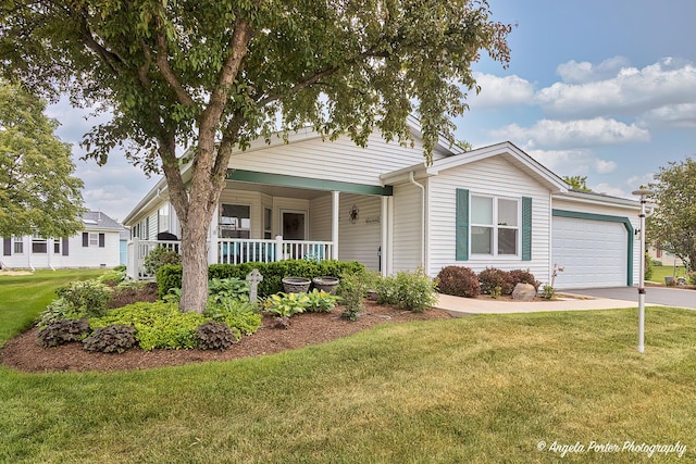 611 Filly Ln, Grayslake, IL 60030 - view of front of house with an attached garage, a front lawn, a porch, and driveway