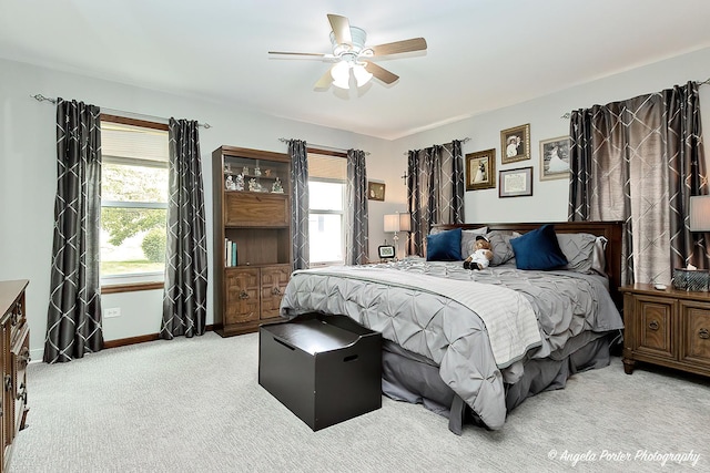 611 Filly Ln, Grayslake, IL 60030 - bedroom featuring multiple windows, light carpet, and ceiling fan