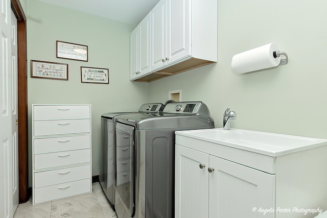 611 Filly Ln, Grayslake, IL 60030 - laundry room with separate washer and dryer, cabinet space, and light marble finish floors