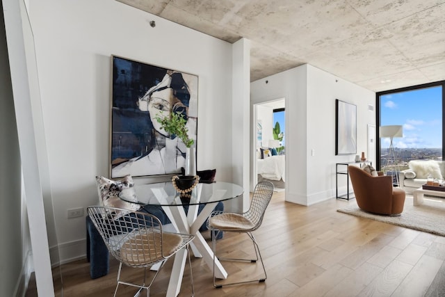 234 W Polk St Unit 2907, Chicago, IL 60607 - dining area featuring wood finished floors and baseboards