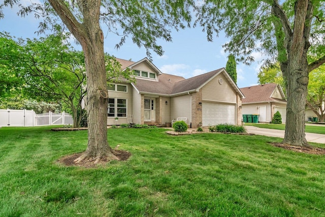 1072 Ronald Dr, Joliet, IL 60435 - view of front of house featuring an attached garage and concrete driveway