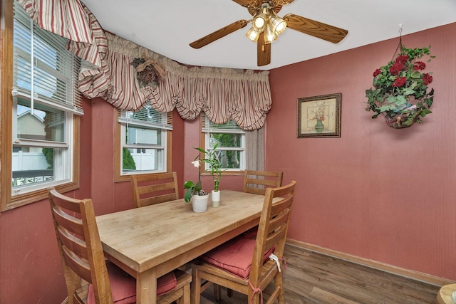 1072 Ronald Dr, Joliet, IL 60435 - dining room with wood finished floors, a ceiling fan, and baseboards