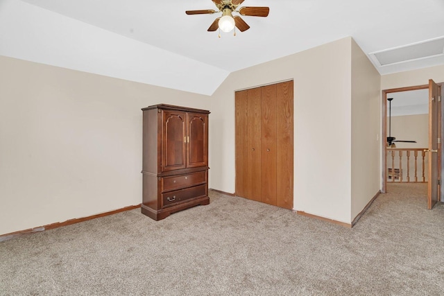 1072 Ronald Dr, Joliet, IL 60435 - unfurnished bedroom featuring light carpet, baseboards, a closet, lofted ceiling, and a ceiling fan