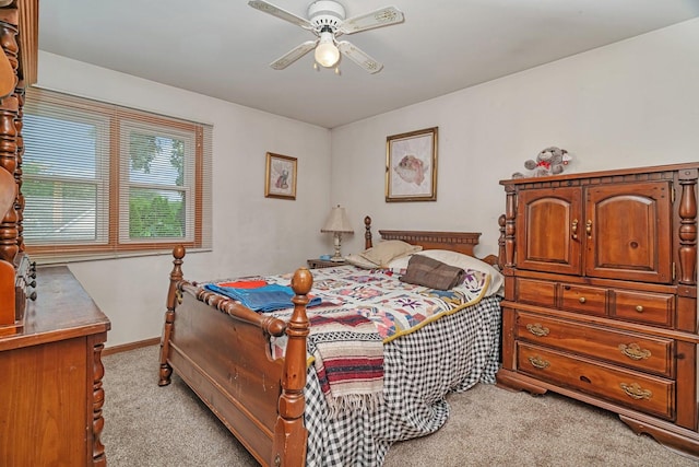 1072 Ronald Dr, Joliet, IL 60435 - bedroom featuring light carpet and ceiling fan
