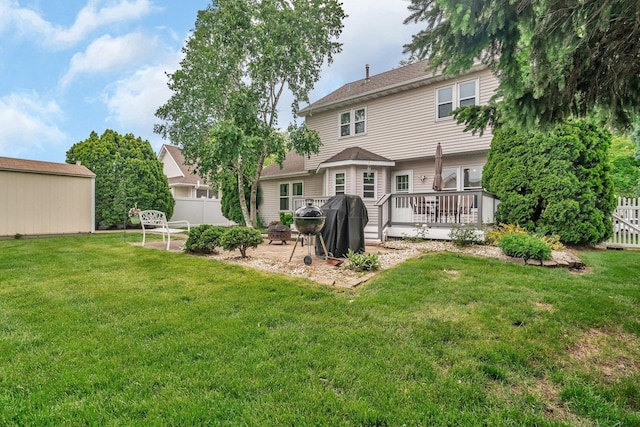 1072 Ronald Dr, Joliet, IL 60435 - rear view of property featuring a wooden deck