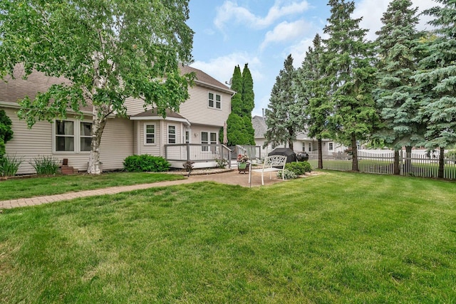 1072 Ronald Dr, Joliet, IL 60435 - view of yard featuring a deck and a patio area