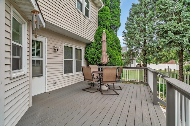 1072 Ronald Dr, Joliet, IL 60435 - wooden terrace with outdoor dining area
