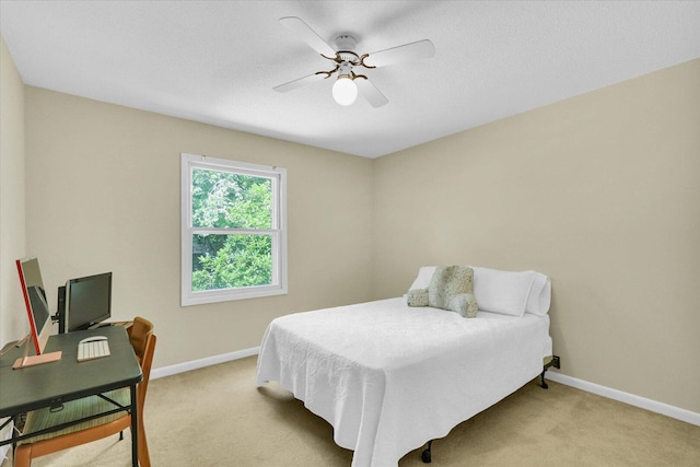 309 E Mchenry St, Urbana, IL 61801 - bedroom featuring light colored carpet and ceiling fan