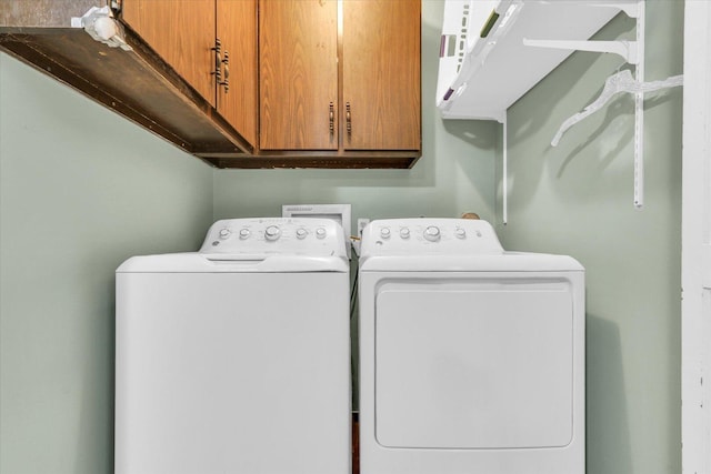 309 E Mchenry St, Urbana, IL 61801 - laundry room with cabinet space and washing machine and dryer