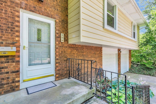 309 E Mchenry St, Urbana, IL 61801 - entrance to property with brick siding and a garage